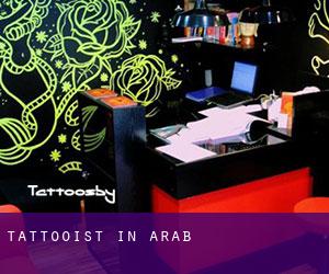 Tattooist in Arab