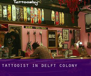 Tattooist in Delft Colony