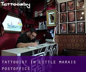 Tattooist in Little Marais Postoffice